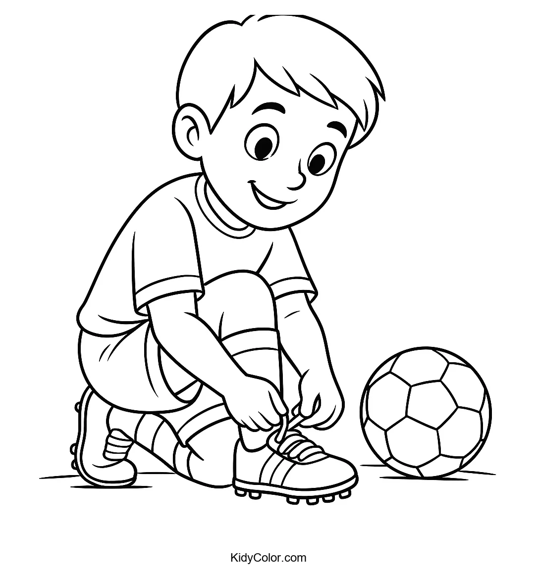 Boy tying soccer cleat