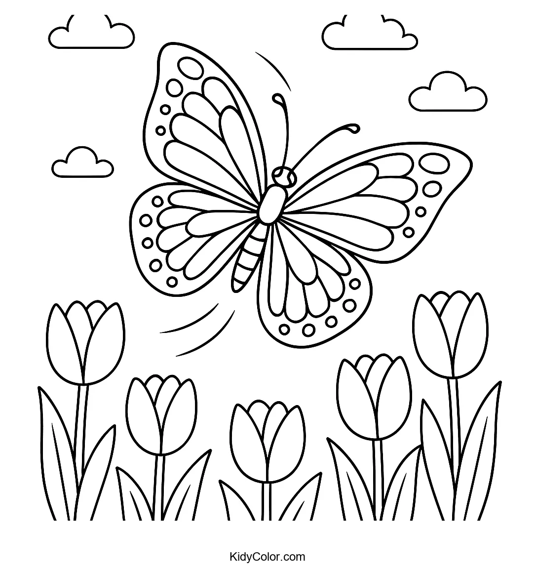 Butterfly hovering over tulips